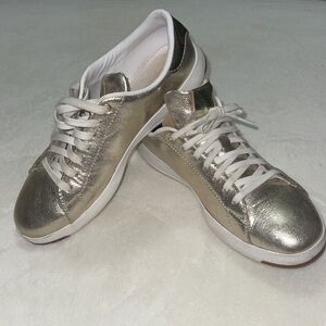 Unique Cole Haan gold grandprø lace up sneakers.  Very comfy and cute.